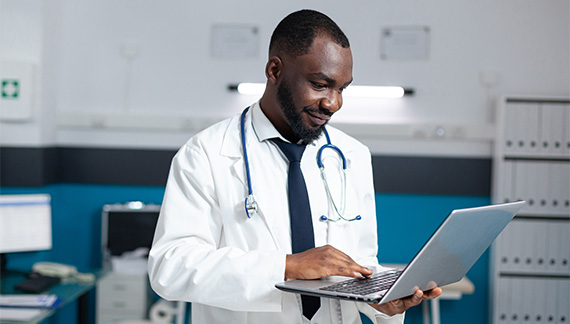 PRF.african-american-therapist-doctor-holding-laptop.WEB-01